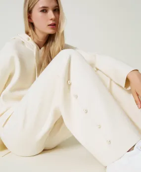Pantaloni wide leg in maglia con perle